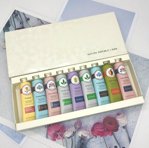 Nature Republic non greasy hand cream collection featuring various scented tubes in a stylish gift box.