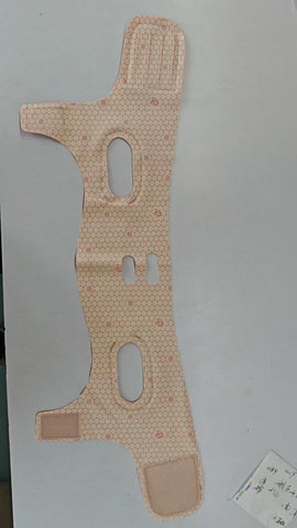 Face mask bandage for lifting and tightening, peach color, designed for facial enhancement, mask type product.